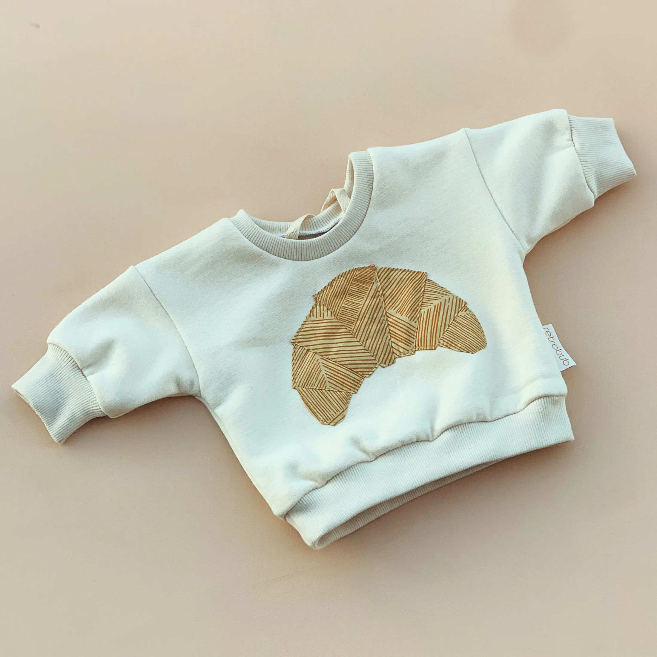 cozy CROISSANT  baby sweater